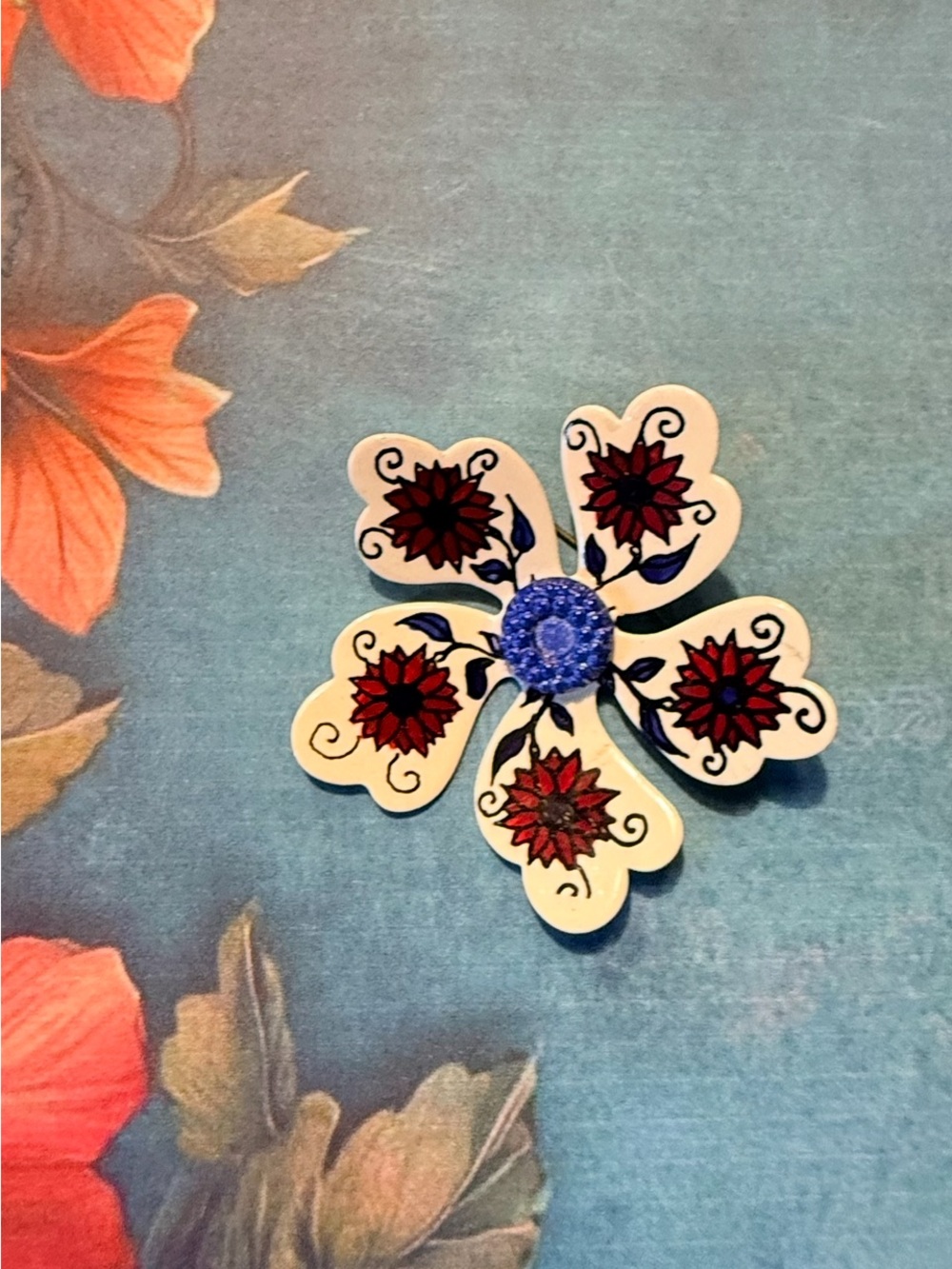 Floral Enamel Brooch in Cream, Red & Blue.